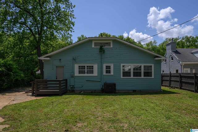 829 1st St SW, Birmingham, AL 35211 - back of house featuring central AC, a deck, and crawl space