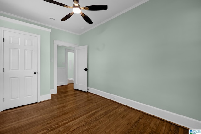 829 1st St SW, Birmingham, AL 35211 - unfurnished bedroom featuring ornamental molding, wood finished floors, baseboards, and a ceiling fan