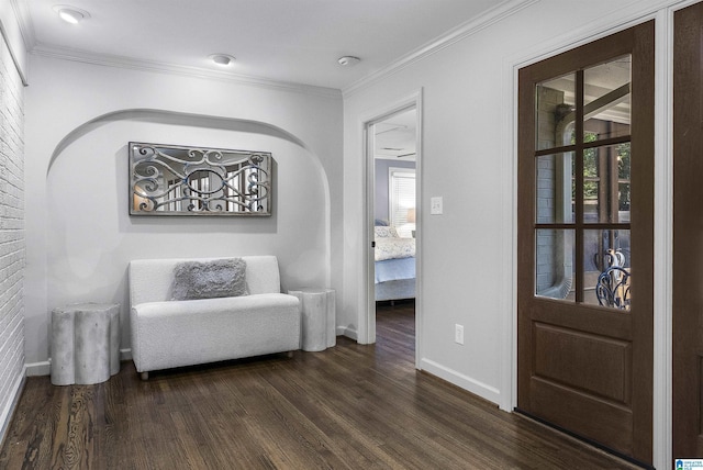 1856 Southwood Rd, Vestavia Hills, AL 35216 - sitting room with baseboards, arched walkways, crown molding, and dark wood-style floors