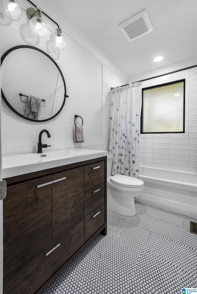 1856 Southwood Rd, Vestavia Hills, AL 35216 - full bathroom with visible vents, tile patterned flooring, vanity, toilet, and shower / bath combo