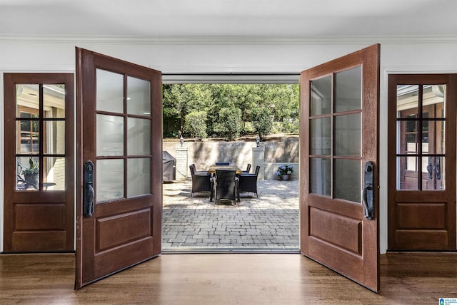 1856 Southwood Rd, Vestavia Hills, AL 35216 - doorway with crown molding and wood finished floors