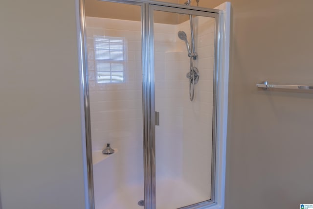 full bathroom featuring a stall shower
