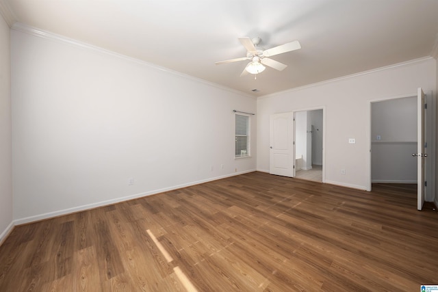 unfurnished bedroom with crown molding, baseboards, a ceiling fan, and wood finished floors