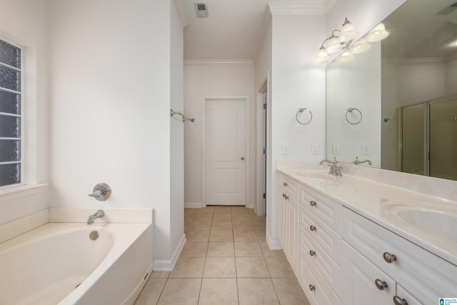full bathroom featuring double vanity, a bath, visible vents, crown molding, and a sink