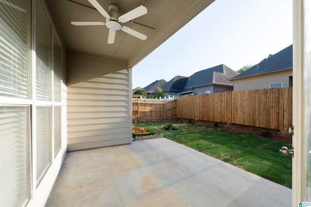view of patio / terrace with a fenced backyard and ceiling fan