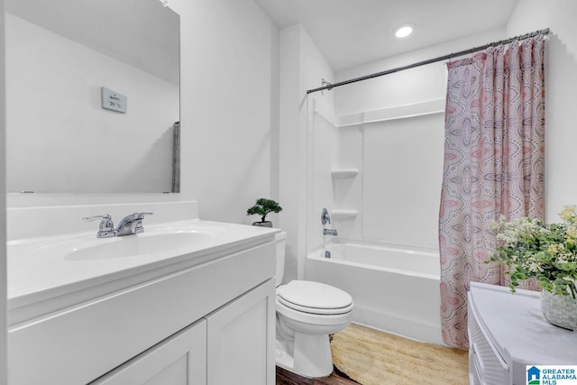full bath with vanity, wood finished floors, toilet, recessed lighting, and shower / tub combo