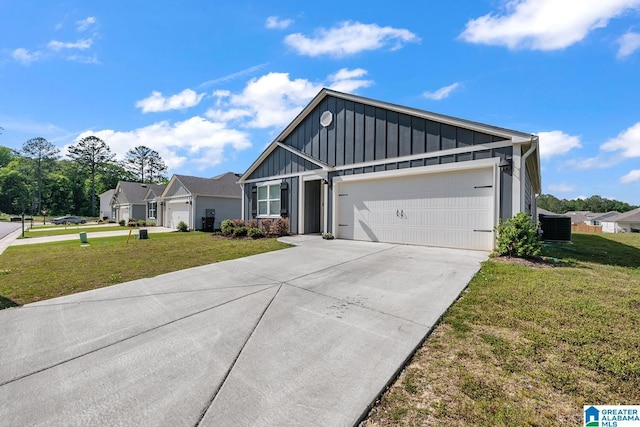 view of front of house with board and batten siding, an attached garage, concrete driveway, and a front lawn