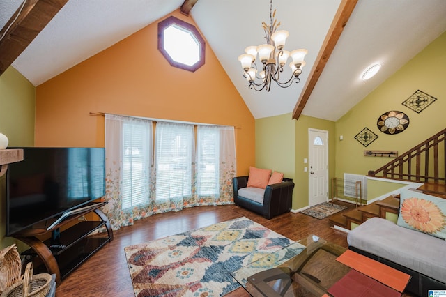 living room featuring stairway, beamed ceiling, wood finished floors, and a notable chandelier
