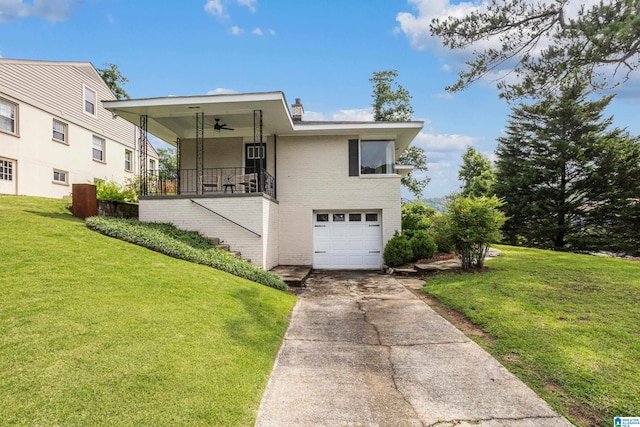 708 Devon Dr, Birmingham, AL 35209 - view of front of house with ceiling fan, brick siding, stairway, and a front yard