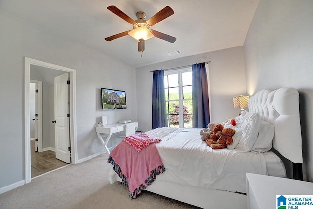bedroom featuring baseboards, a ceiling fan, carpet floors, and visible vents