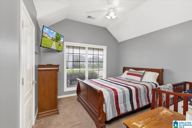 bedroom with ceiling fan, light carpet, baseboards, vaulted ceiling, and visible vents