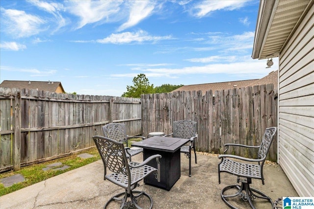 view of patio with a fenced backyard