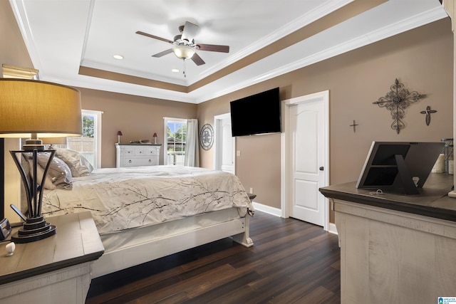 1018 Sheraton Rd SW, Cullman, AL 35055 - bedroom featuring crown molding, dark wood-style flooring, a raised ceiling, recessed lighting, and baseboards