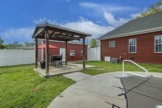 1018 Sheraton Rd SW, Cullman, AL 35055 - view of patio with a fenced backyard, central AC, and area for grilling