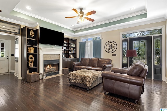 1018 Sheraton Rd SW, Cullman, AL 35055 - living room featuring wood-type flooring, a fireplace with flush hearth, ceiling fan, and ornamental molding