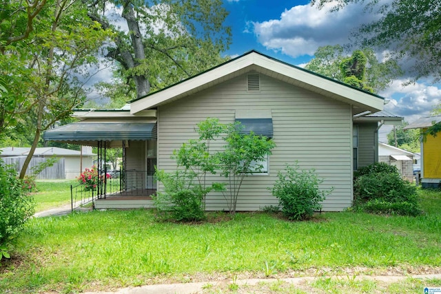 exterior space with a lawn