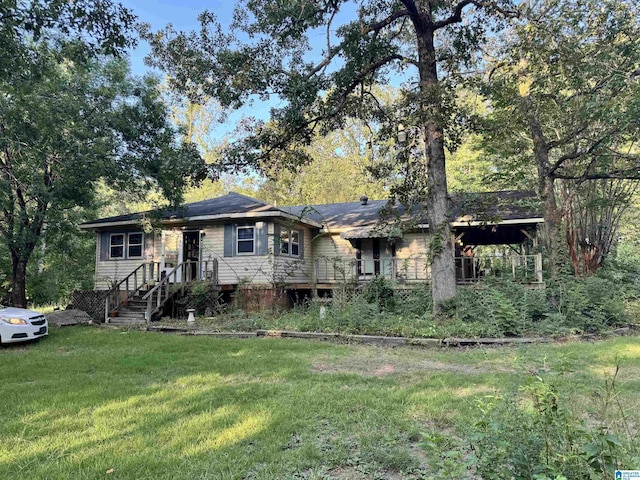 ranch-style house with a front lawn