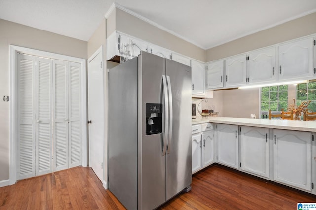 kitchen featuring stainless steel refrigerator with ice dispenser, white cabinetry, and dark wood-type flooring