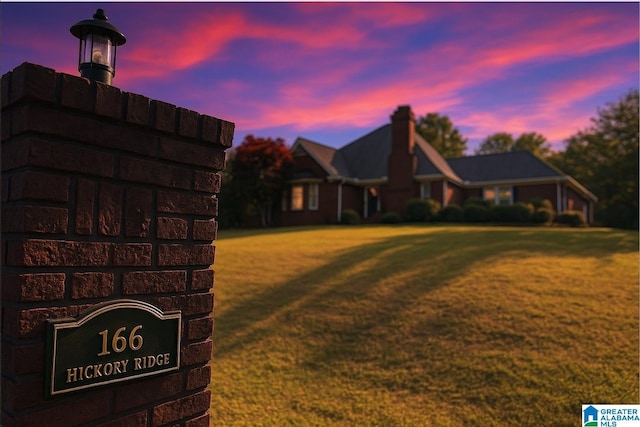 166 Hickory Ridge Dr, Glencoe, AL 35905 - view of front of house with a front lawn and a chimney