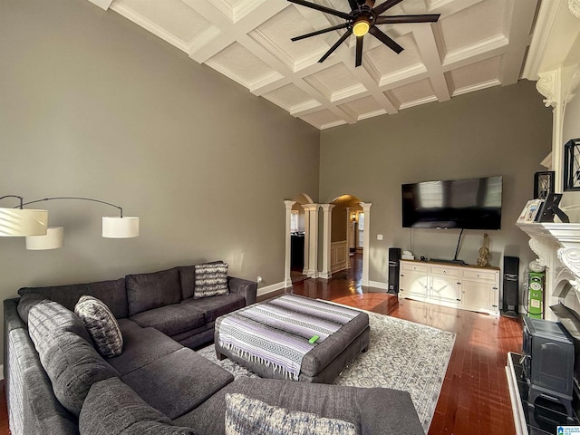 166 Hickory Ridge Dr, Glencoe, AL 35905 - living room featuring a ceiling fan, ornate columns, coffered ceiling, dark wood-style flooring, and beamed ceiling