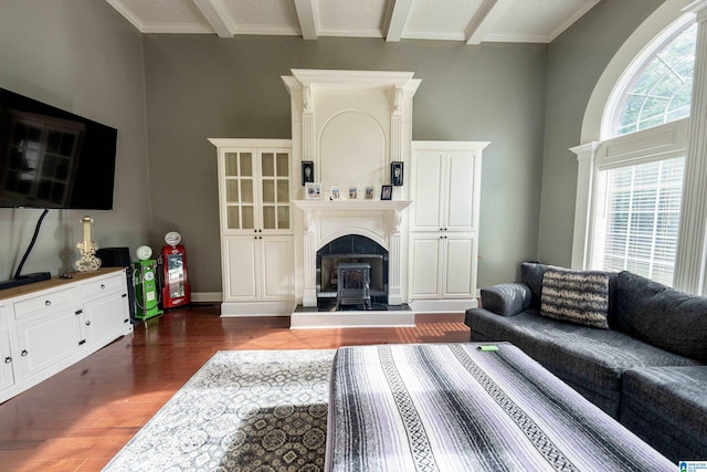 166 Hickory Ridge Dr, Glencoe, AL 35905 - living area with wood finished floors, a fireplace with raised hearth, and beamed ceiling