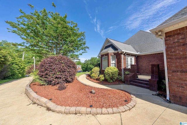 166 Hickory Ridge Dr, Glencoe, AL 35905 - view of side of home with brick siding and roof with shingles