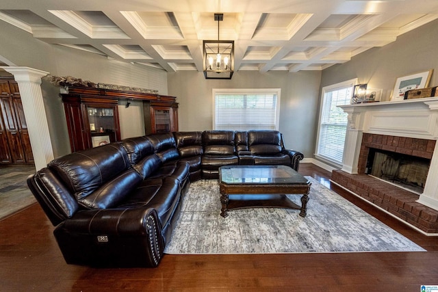 166 Hickory Ridge Dr, Glencoe, AL 35905 - living area with coffered ceiling, a chandelier, a brick fireplace, beam ceiling, and wood finished floors