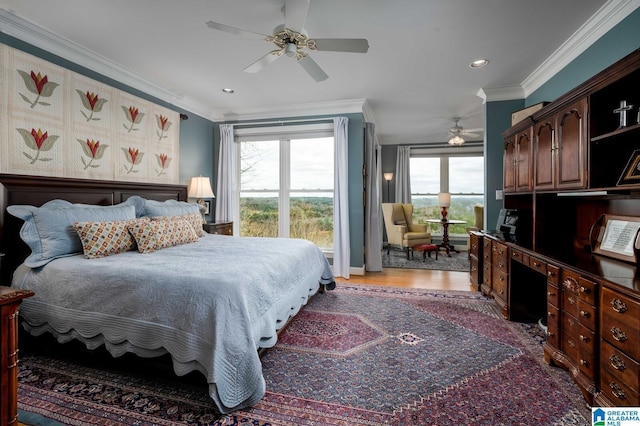 bedroom with multiple windows, ornamental molding, and recessed lighting