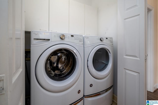 laundry room featuring washer and dryer and cabinet space