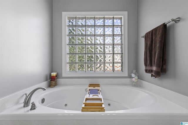 full bath with a jetted tub