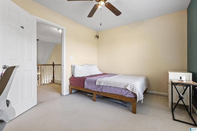 bedroom with carpet floors, a ceiling fan, and baseboards