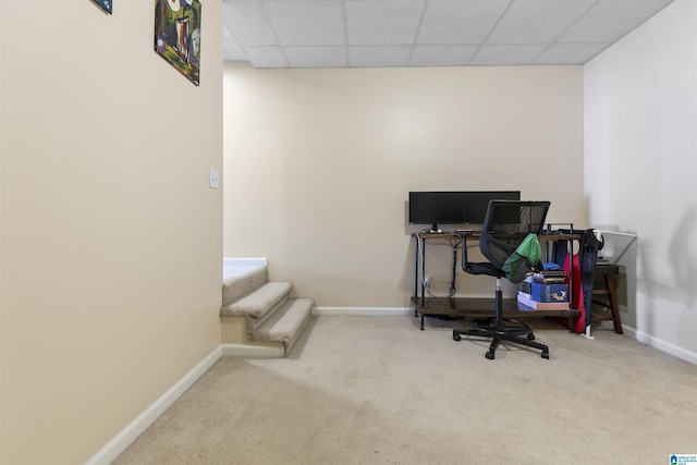office with baseboards, carpet, and a paneled ceiling