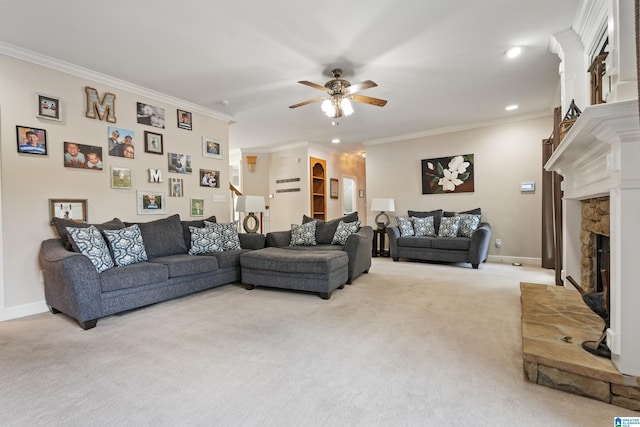 living room with crown molding, a ceiling fan, light carpet, and a fireplace