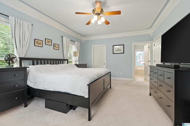 bedroom featuring ceiling fan, light colored carpet, baseboards, connected bathroom, and ornamental molding