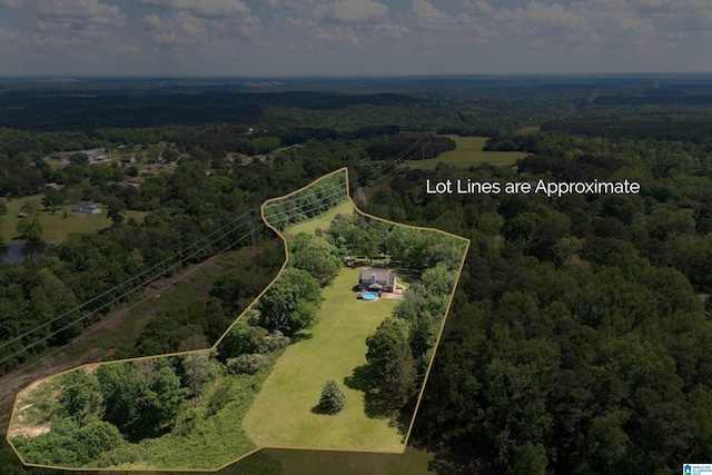 aerial view featuring a forest view