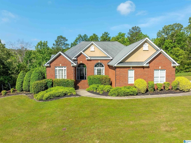 306 Oak Leaf Ln, Glencoe, AL 35905 - single story home with brick siding and a front lawn