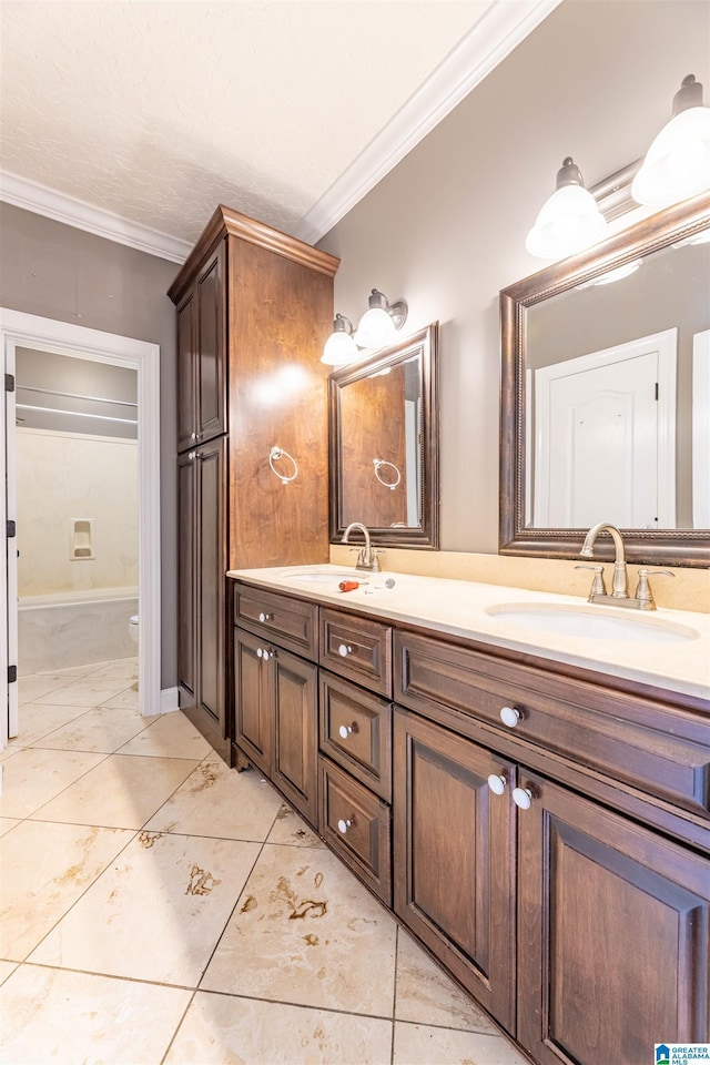 306 Oak Leaf Ln, Glencoe, AL 35905 - full bath featuring crown molding, a sink, double vanity, and toilet