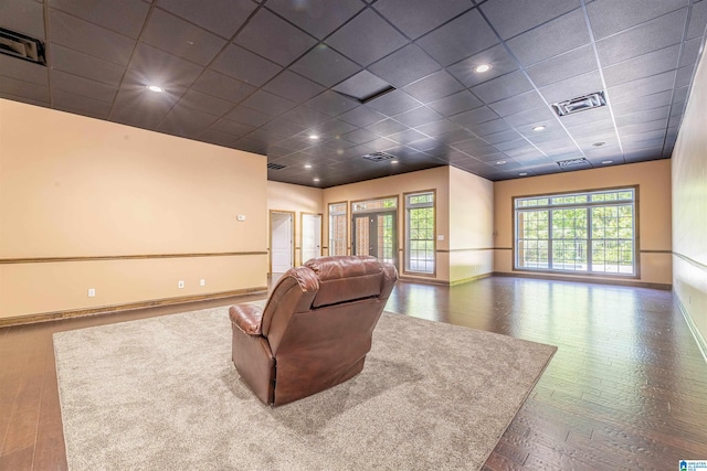 306 Oak Leaf Ln, Glencoe, AL 35905 - living area with baseboards, visible vents, and wood finished floors