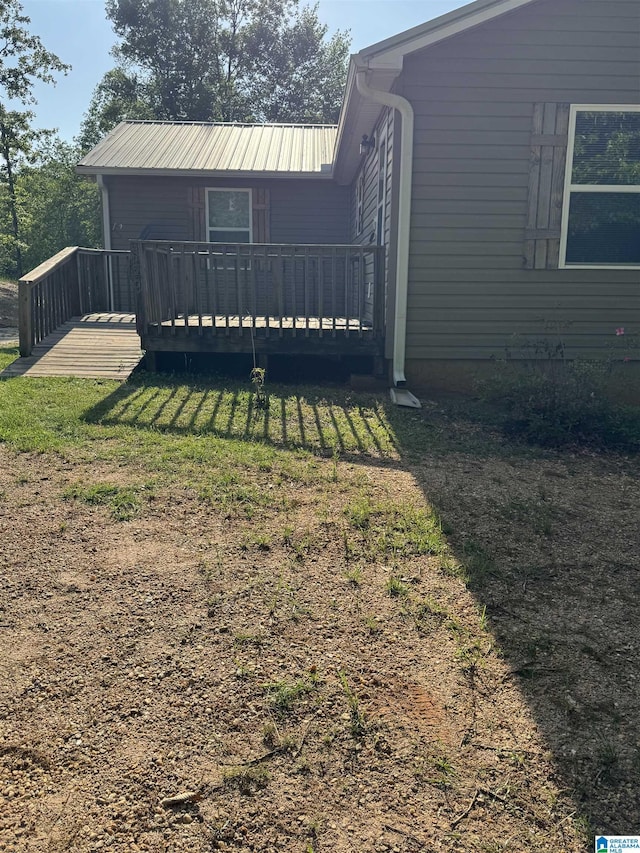 view of yard featuring a wooden deck