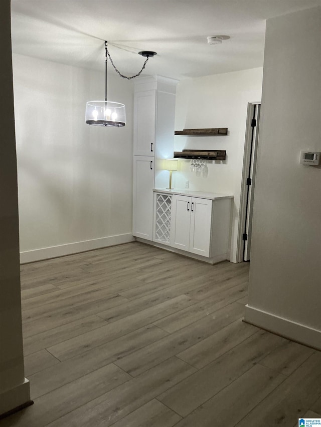 3101 Lorna Rd Unit 1626, Hoover, AL 35216 - unfurnished dining area featuring baseboards and wood finished floors