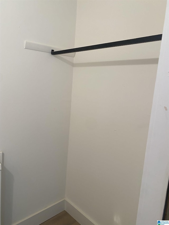 3101 Lorna Rd Unit 1626, Hoover, AL 35216 - spacious closet with dark wood-style floors