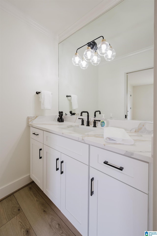 3101 Lorna Rd Unit 1626, Hoover, AL 35216 - bathroom with crown molding, vanity, and wood finished floors