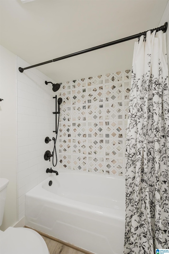 3101 Lorna Rd Unit 1626, Hoover, AL 35216 - full bathroom with shower / tub combo with curtain and wood finished floors