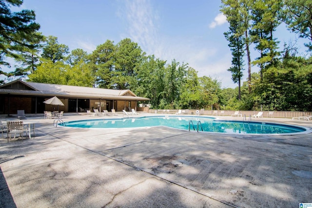 3101 Lorna Rd Unit 1626, Hoover, AL 35216 - community pool with a patio area and view of scattered trees