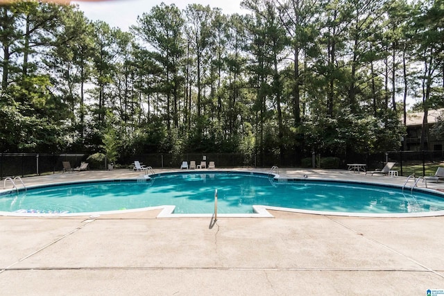 3101 Lorna Rd Unit 1626, Hoover, AL 35216 - community pool featuring a patio area and view of scattered trees