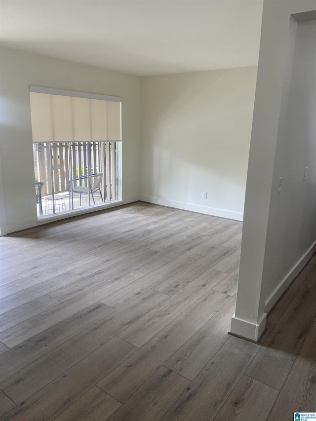 3101 Lorna Rd Unit 1626, Hoover, AL 35216 - unfurnished room featuring baseboards and wood finished floors