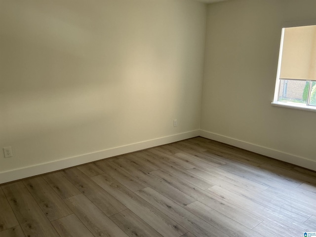 3101 Lorna Rd Unit 1626, Hoover, AL 35216 - spare room featuring baseboards and wood finished floors
