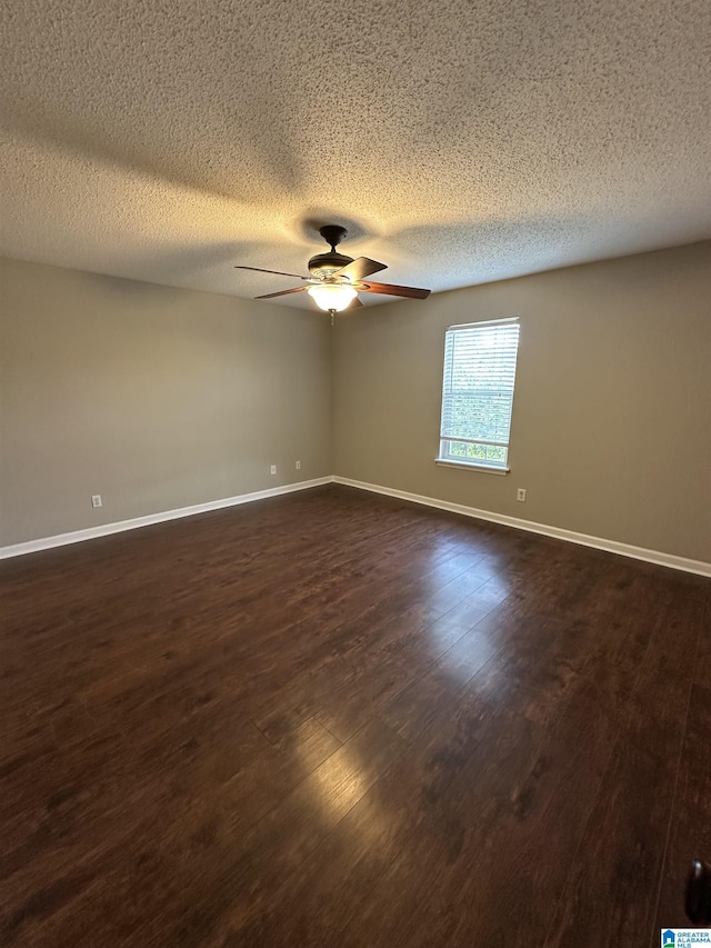 2003 Patton Creek Dr Unit 2003, Hoover, AL 35226 - empty room featuring baseboards, a textured ceiling, dark wood-style flooring, and ceiling fan