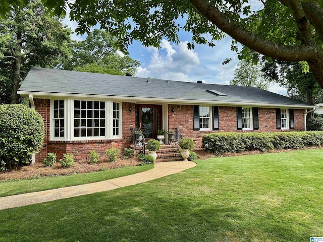 1849 Indian Hill Rd, Vestavia Hills, AL 35216 - ranch-style house with brick siding and a front lawn