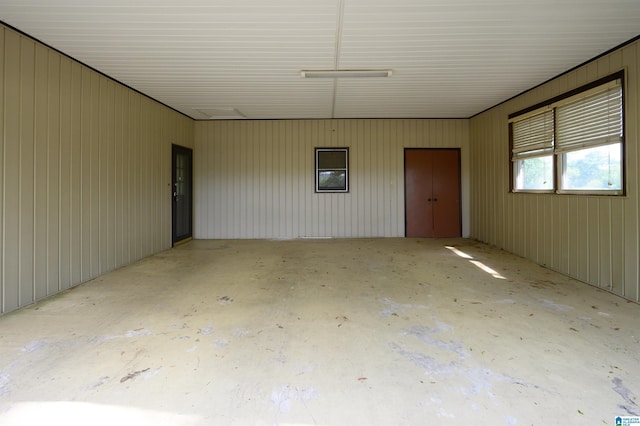 interior space with unfinished concrete floors